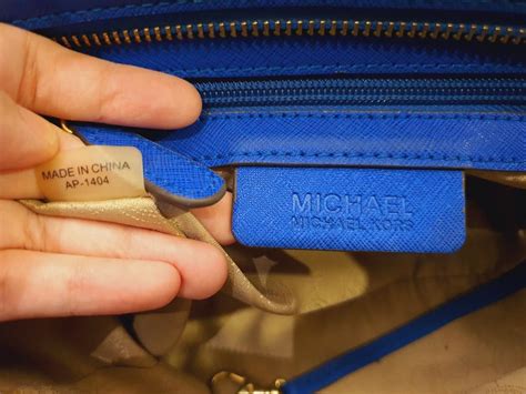 e 1308 michael kors|michael kors purse serial number.